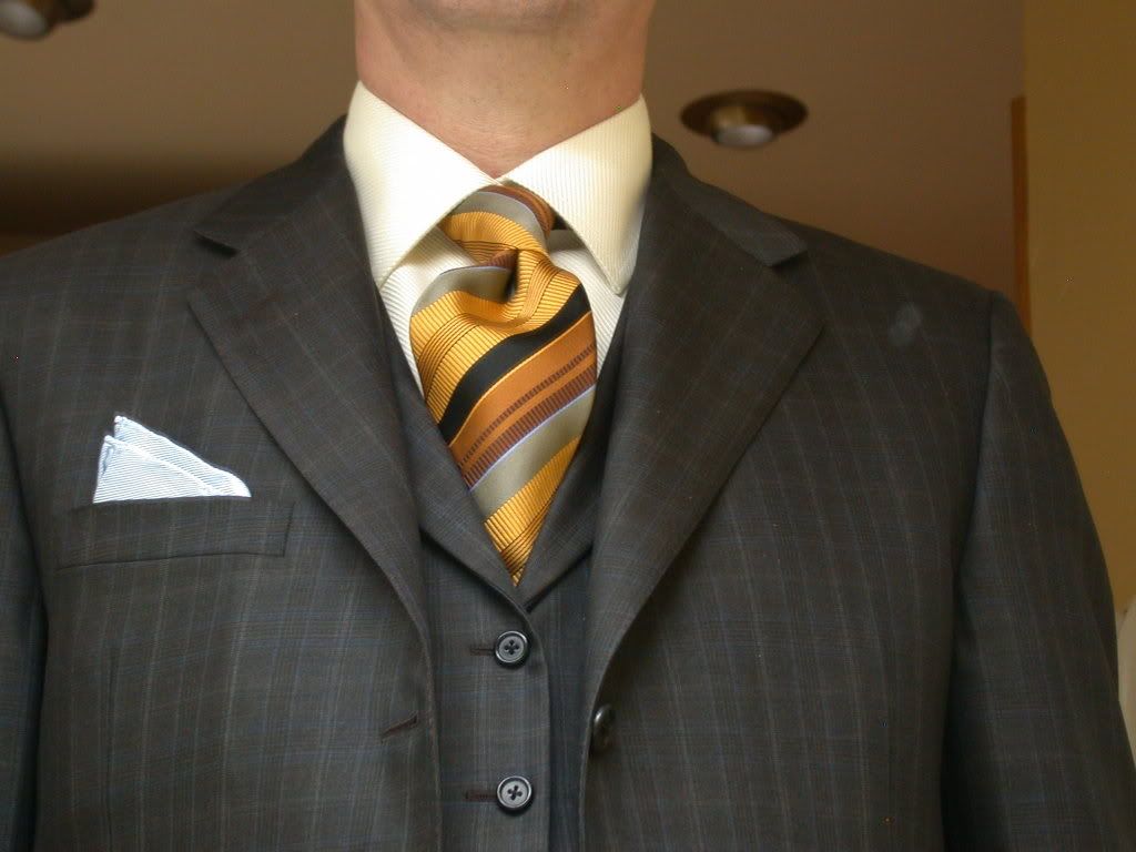 matching tie with brown suit